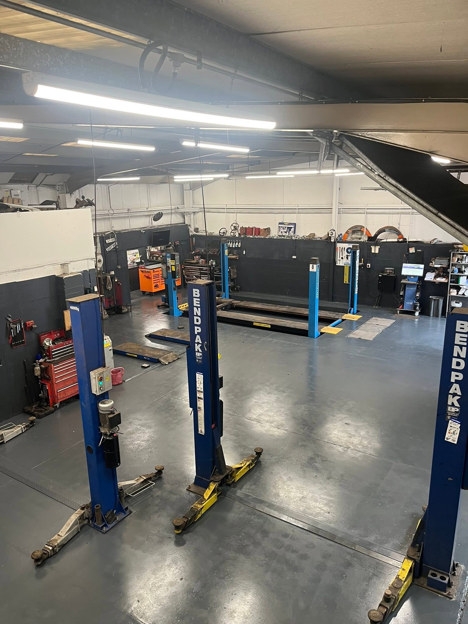 Two-post lifts across the Morris Autos workshop